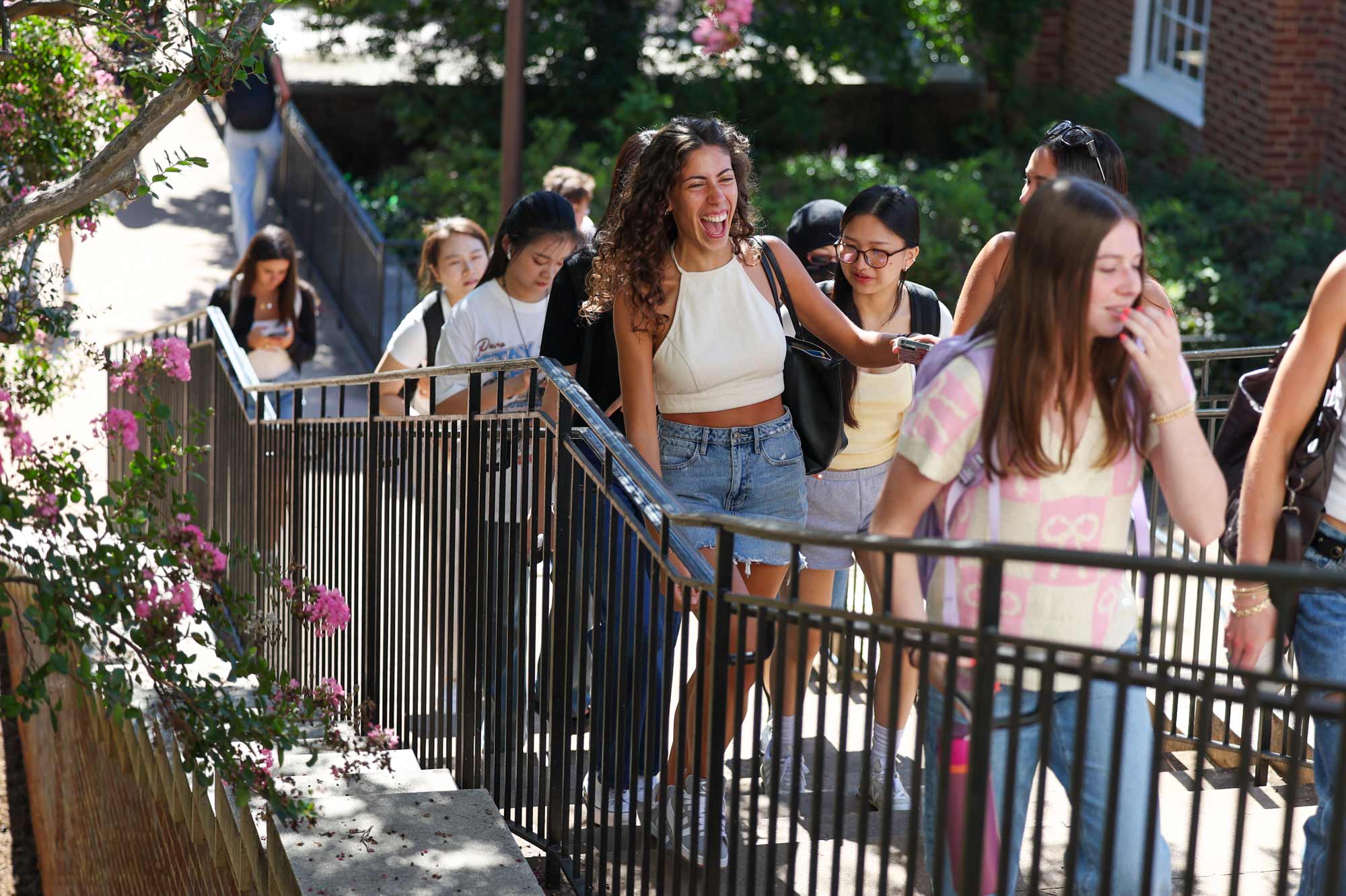 students walking up the stairs on Grounds at UVA