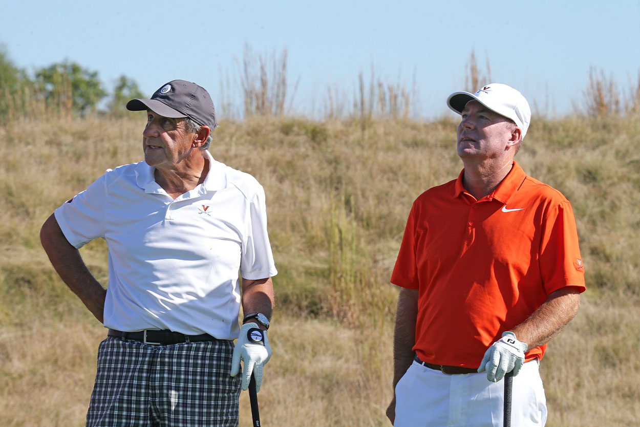 Bob Rotella, left, and UVA coach Bowen Sargent, right, together on the golf course