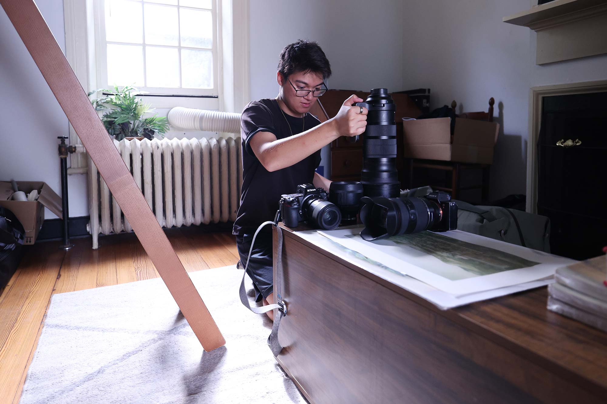 Lozada adjusting his cameras.