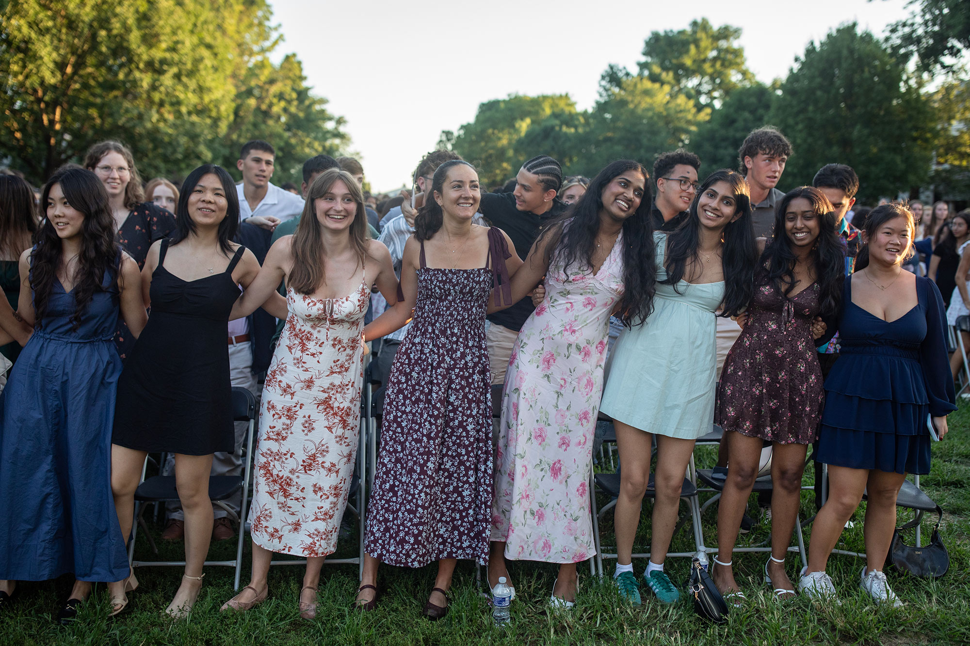 Students link arms and sway while singing “The Good Old Song,” a longstanding UVA tradition.