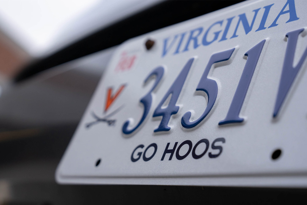 Angled photo of one of the new "Go Hoos" license plates.