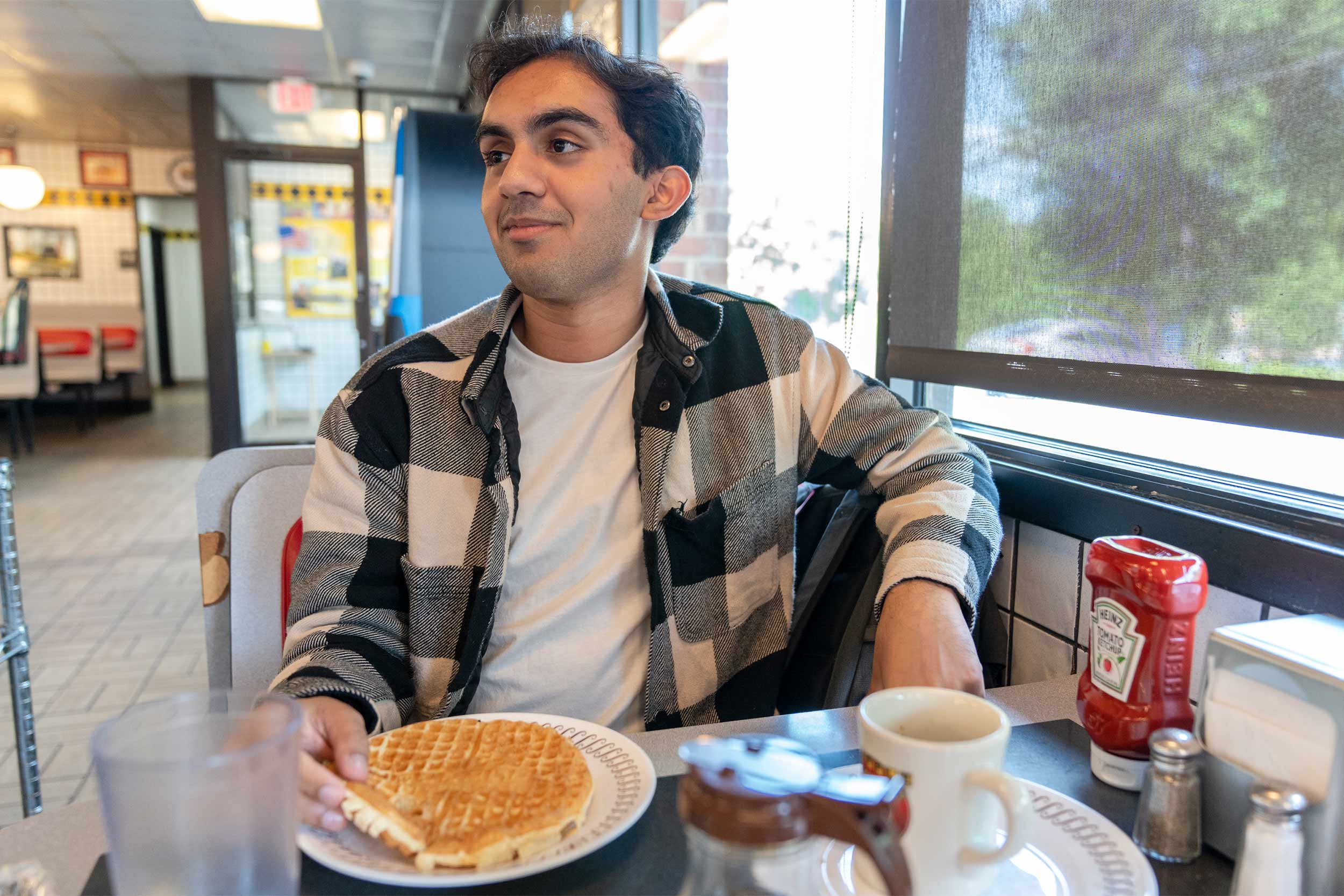 Portrait of Ibraheem Qureshi in Waffle House