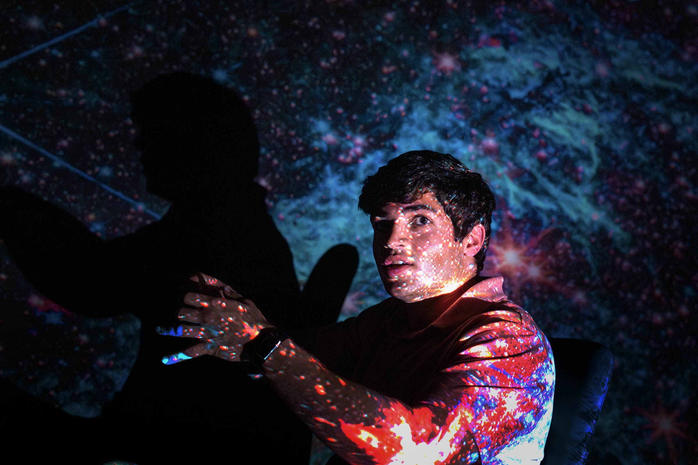 A picture of Samuel Crowe inside the planetarium.