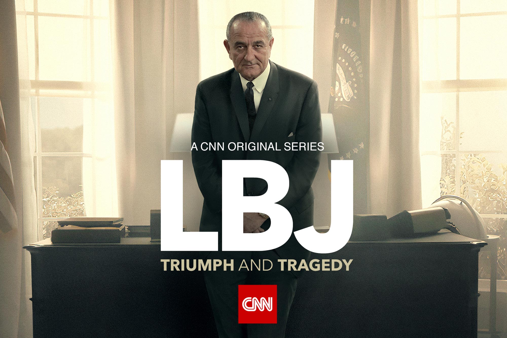 LBJ standing at his desk with text that reads: A CNN Original Series LBJ Triumph and Tragedy