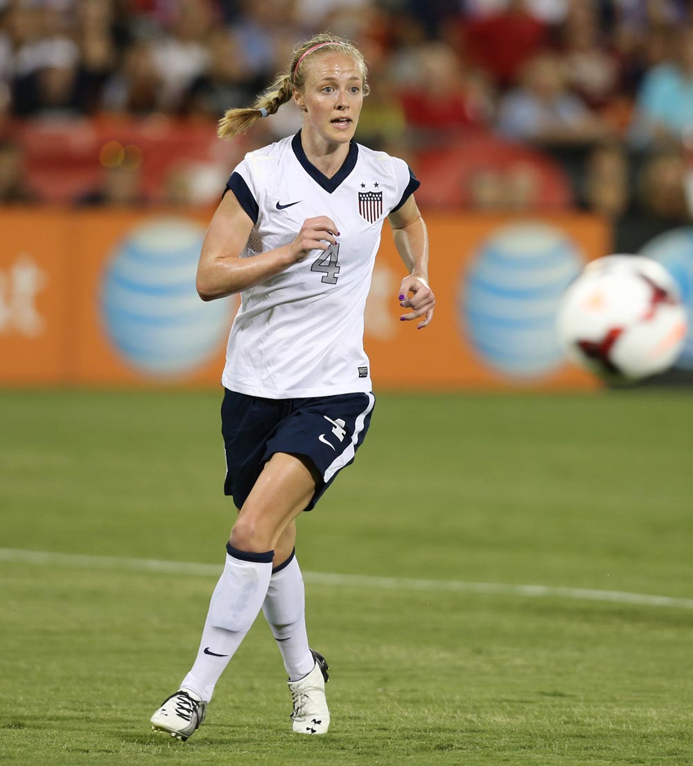 Becky Sauerbrunn runs down a soccer field