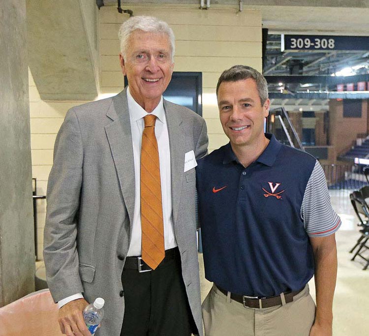 Terry Holland and Tony Bennett standing together, smiling for a picture