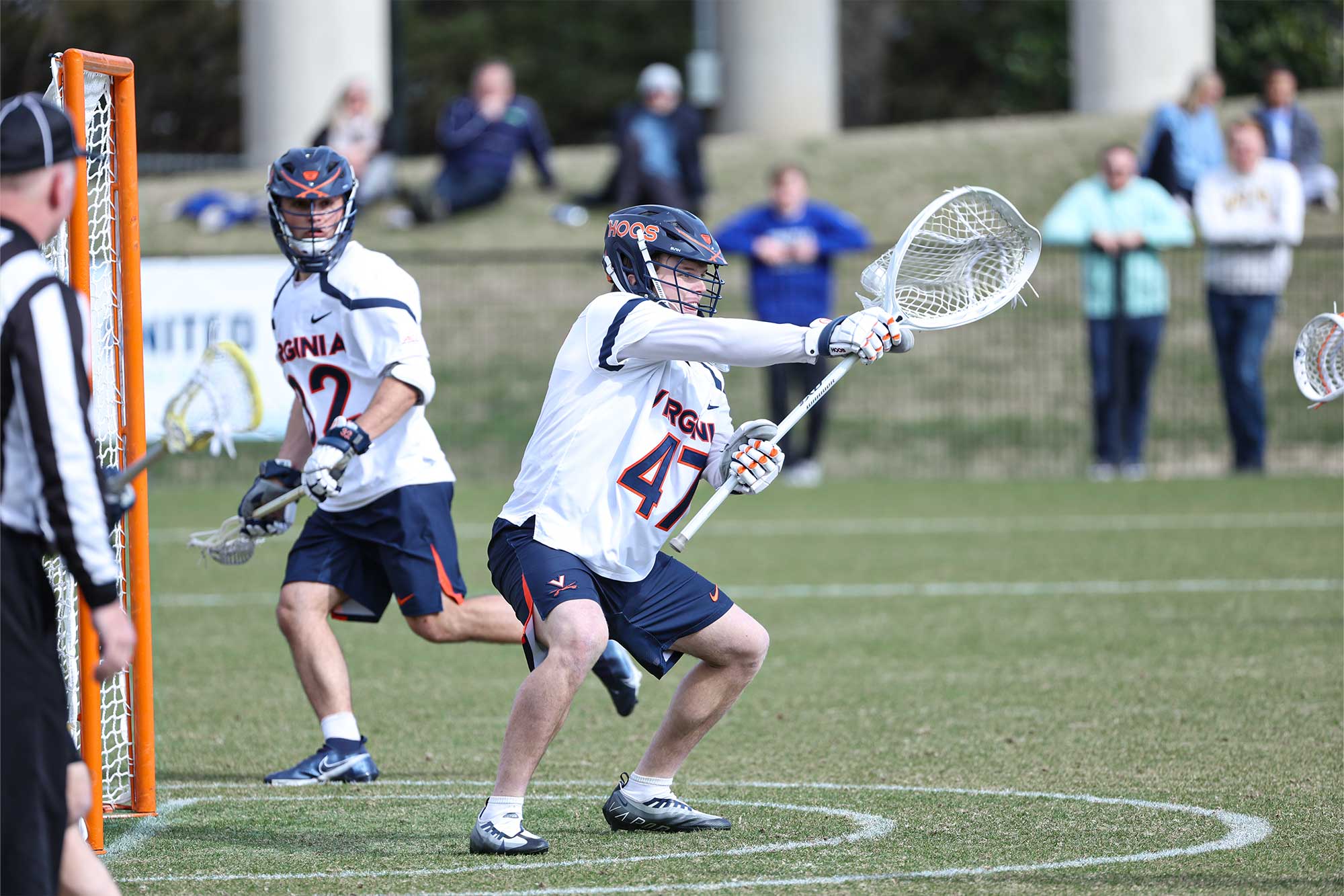 David Roselle playing goalie in a lacrosse game