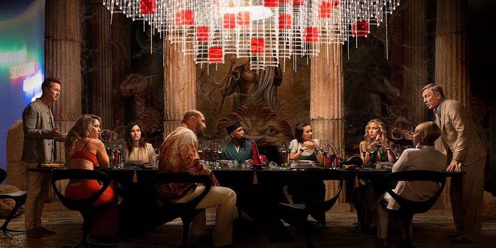 A group of adults having a fancy dinner party