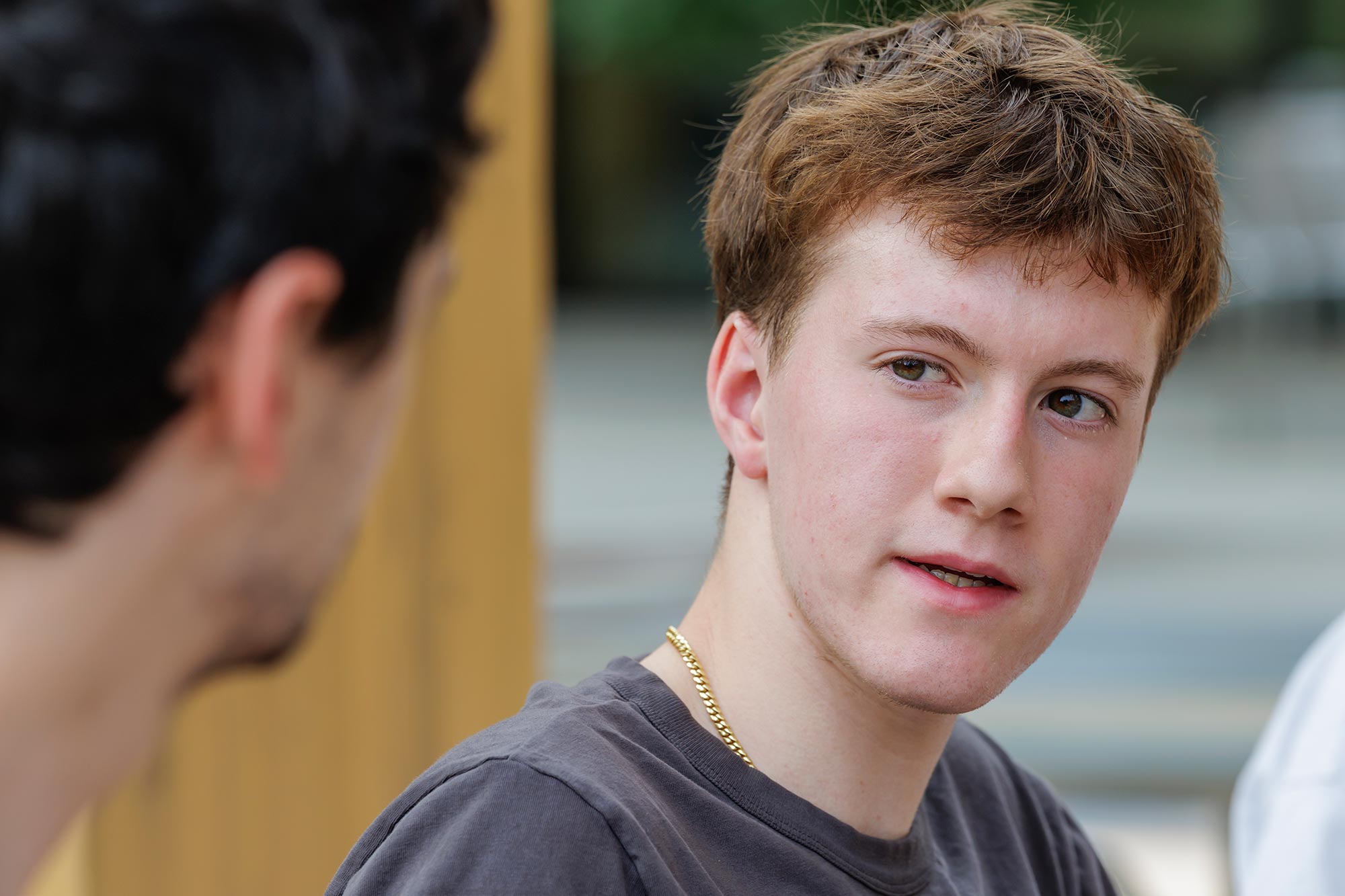 Declan Connor and peer talking.