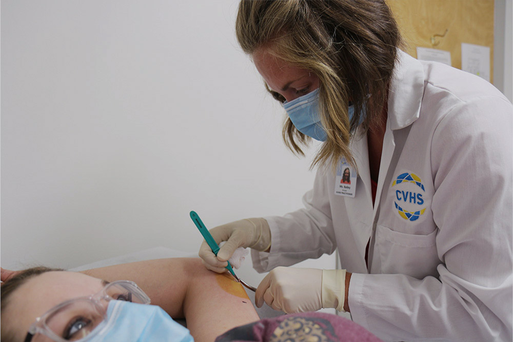 Nurse Practitioner working on a patient
