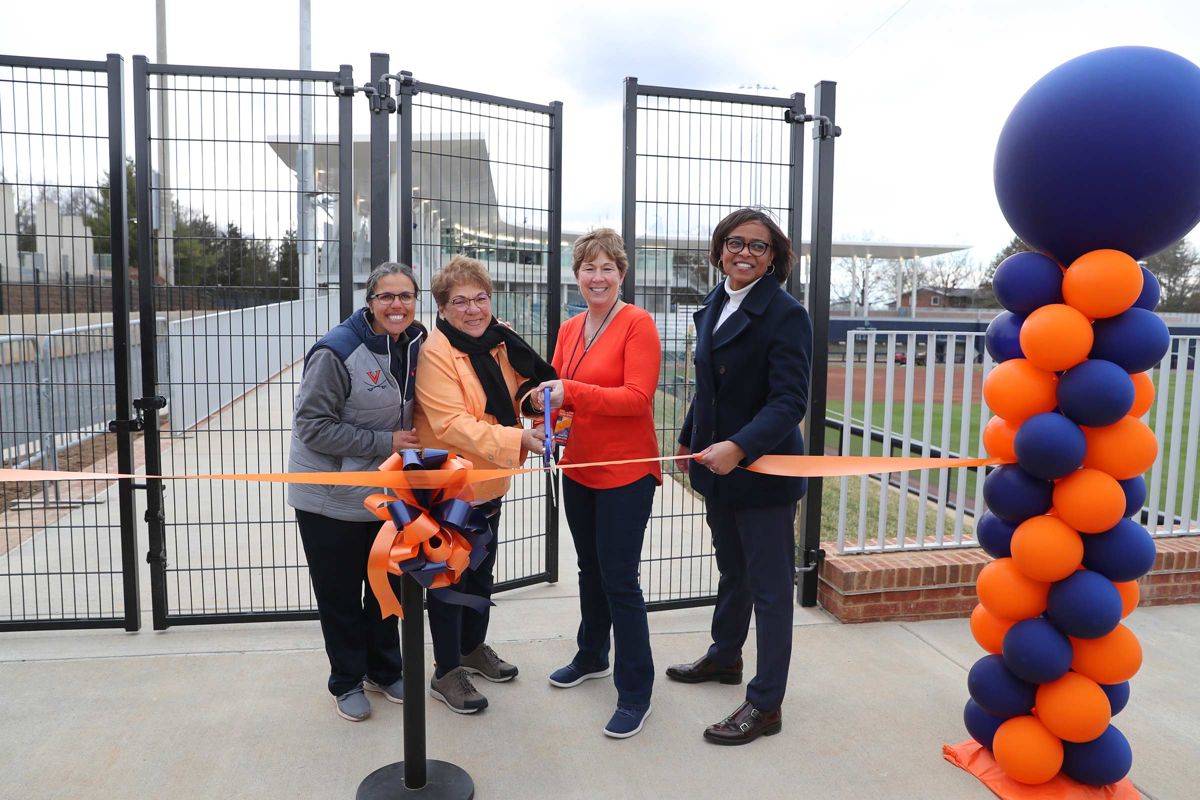 UVA softball coach Joanna Hardin, Fran Palmer, Lisa Palmer and Director of Athletics Carla Williams headlined Palmer Park’s dedication in March 2020. 