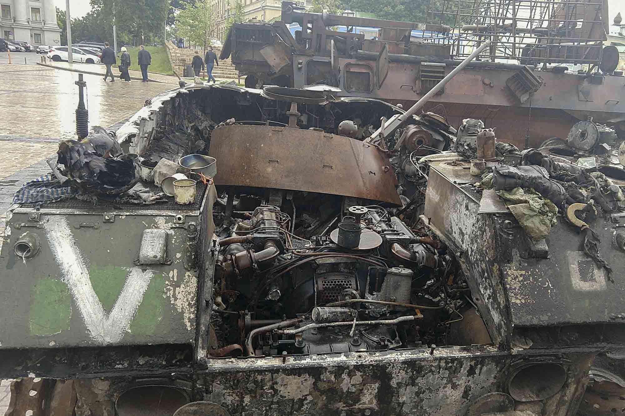 A pile of broken and burned military equipment