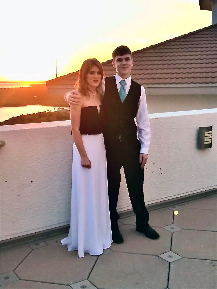 Hannah and Zachary Shapiro pose together in formal attire
