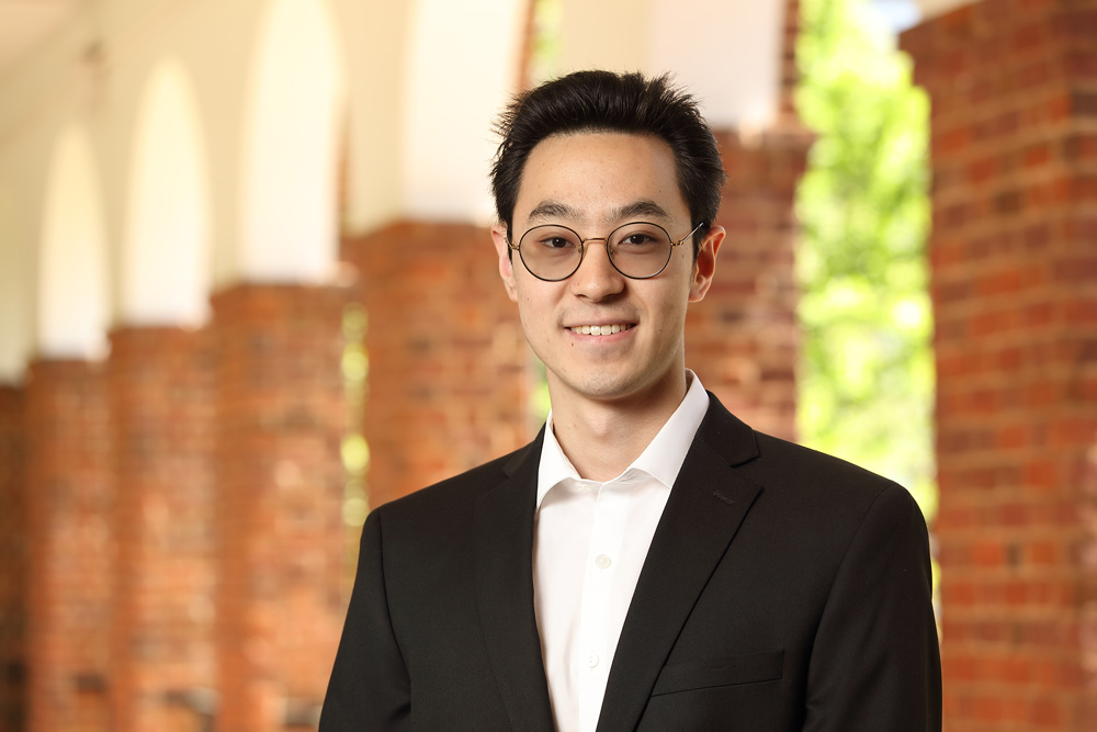 Andrew Li smiles for a portrait