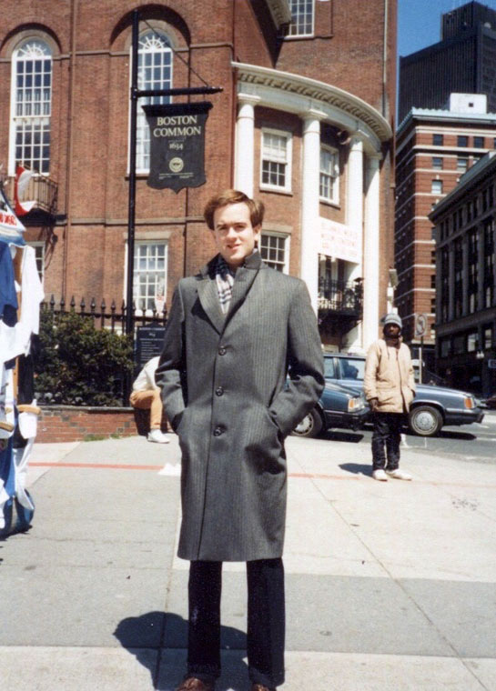 Portrait of John Owen wearing a warm jacket outside in Boston around 1989