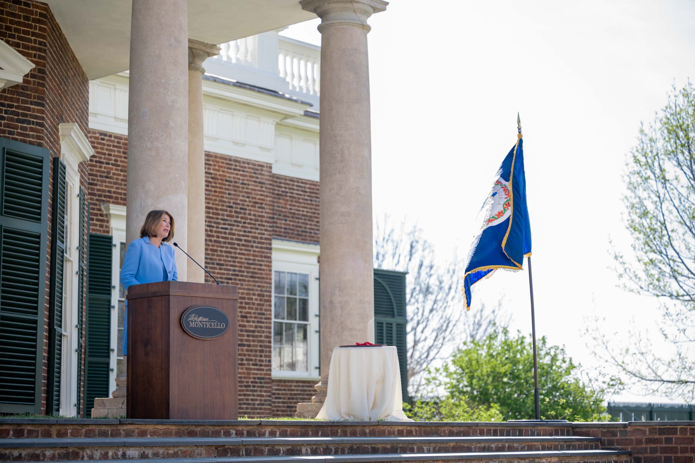 Westin speaks from a podium in front of Monticello.