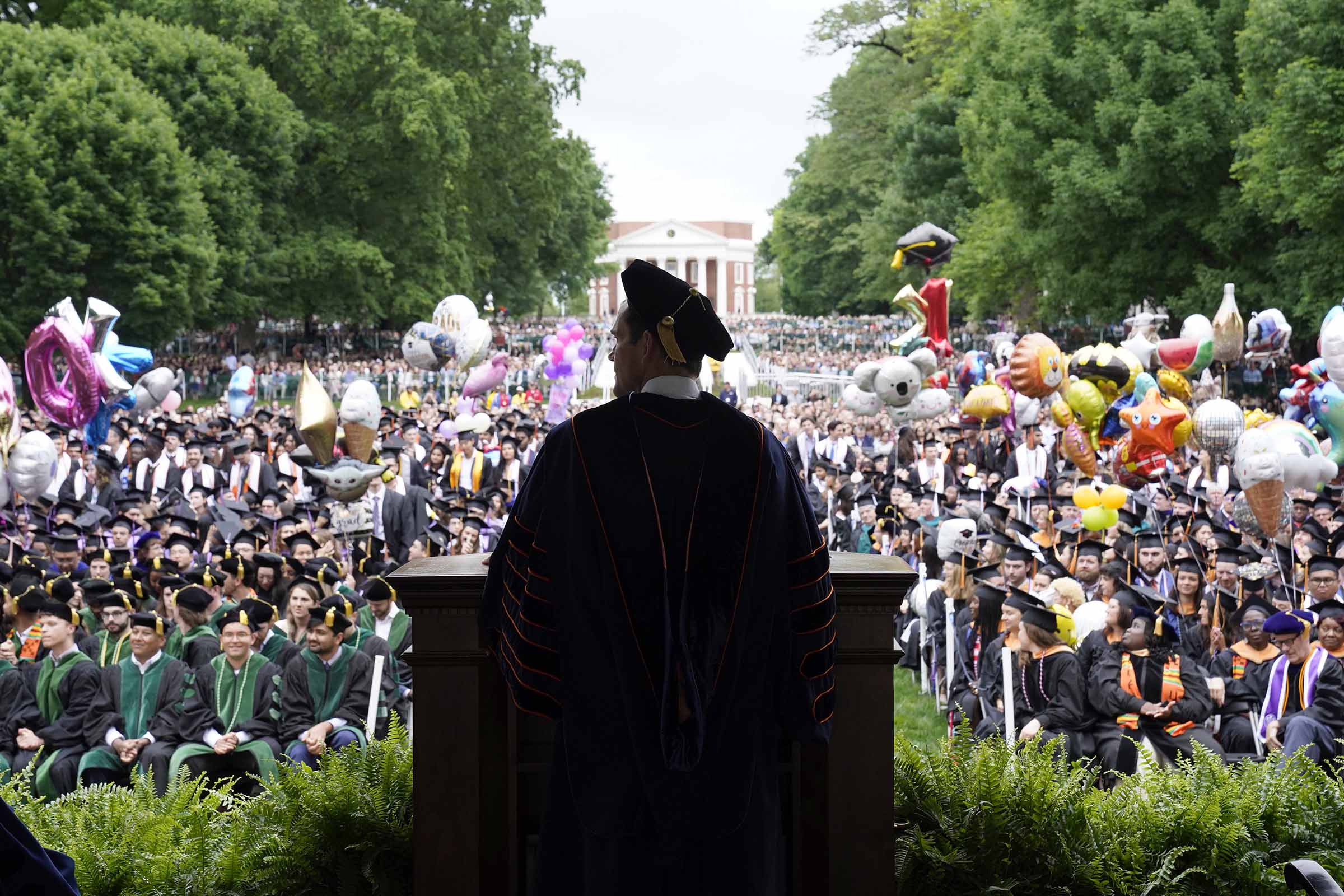 A view of the class of 2024 from behind President Jim Ryan as he speaks
