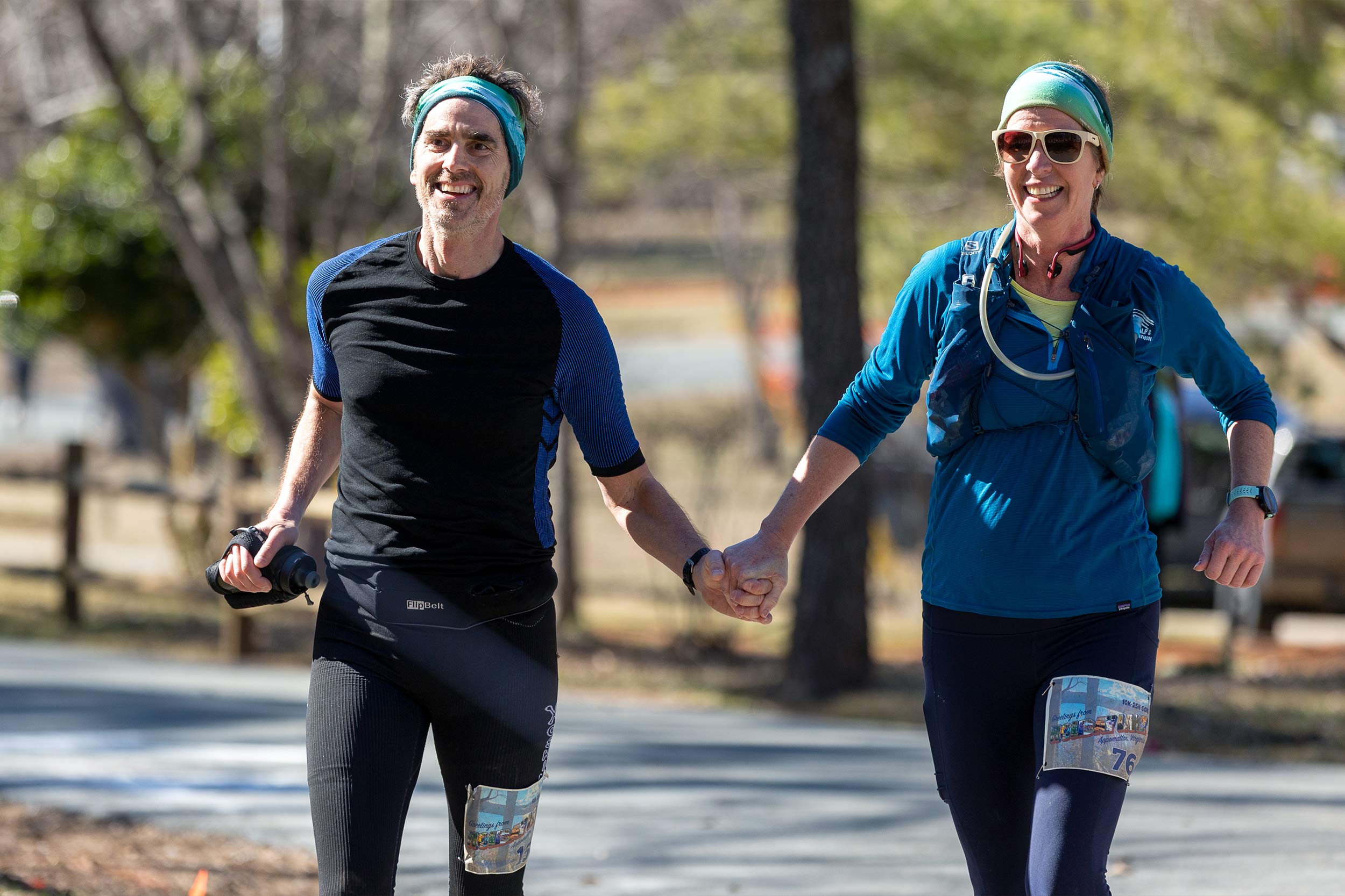 Costi Sifri and Debbie Henderson running at Holiday Lake
