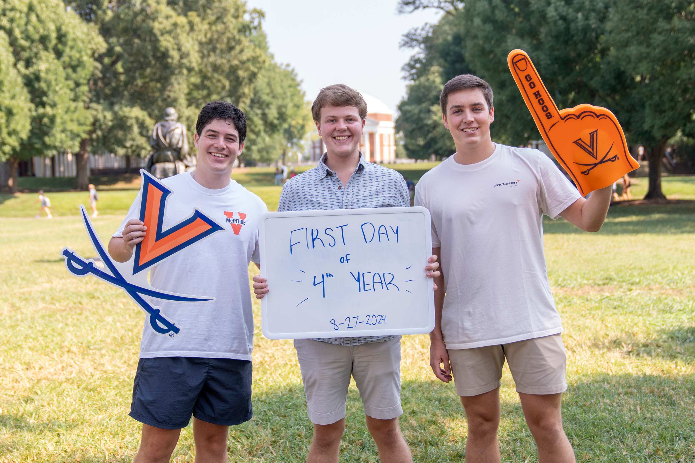 Portrait of UVA fourth-year students from left to right Jack Wilcox, Joseph Harrell and Will Stevens commemorate the first day of the new academic year.