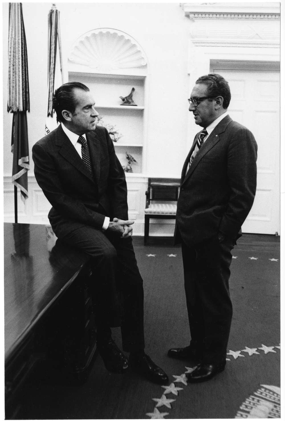 President Nixon talking with Secretary of State Henry Kissinger 