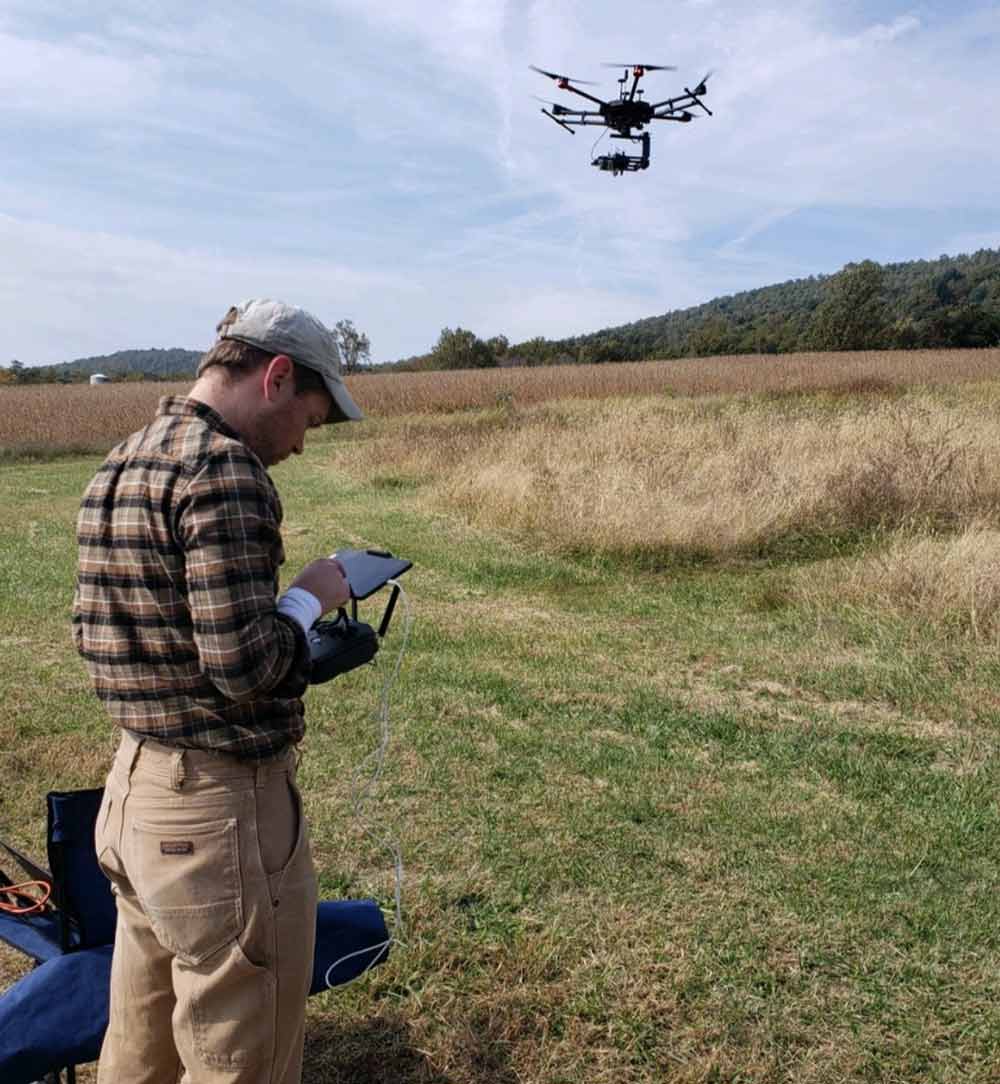 Flying a drone to survey the land