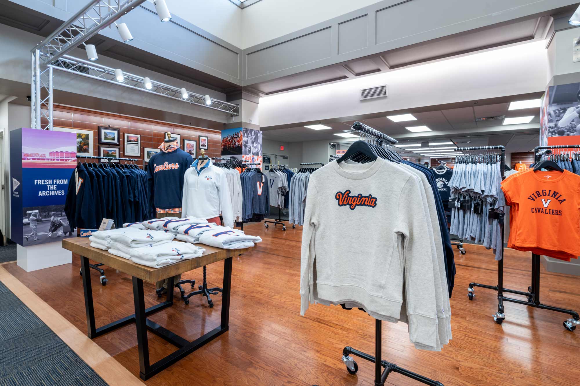 UVA merch hanging in the UVA Bookstore