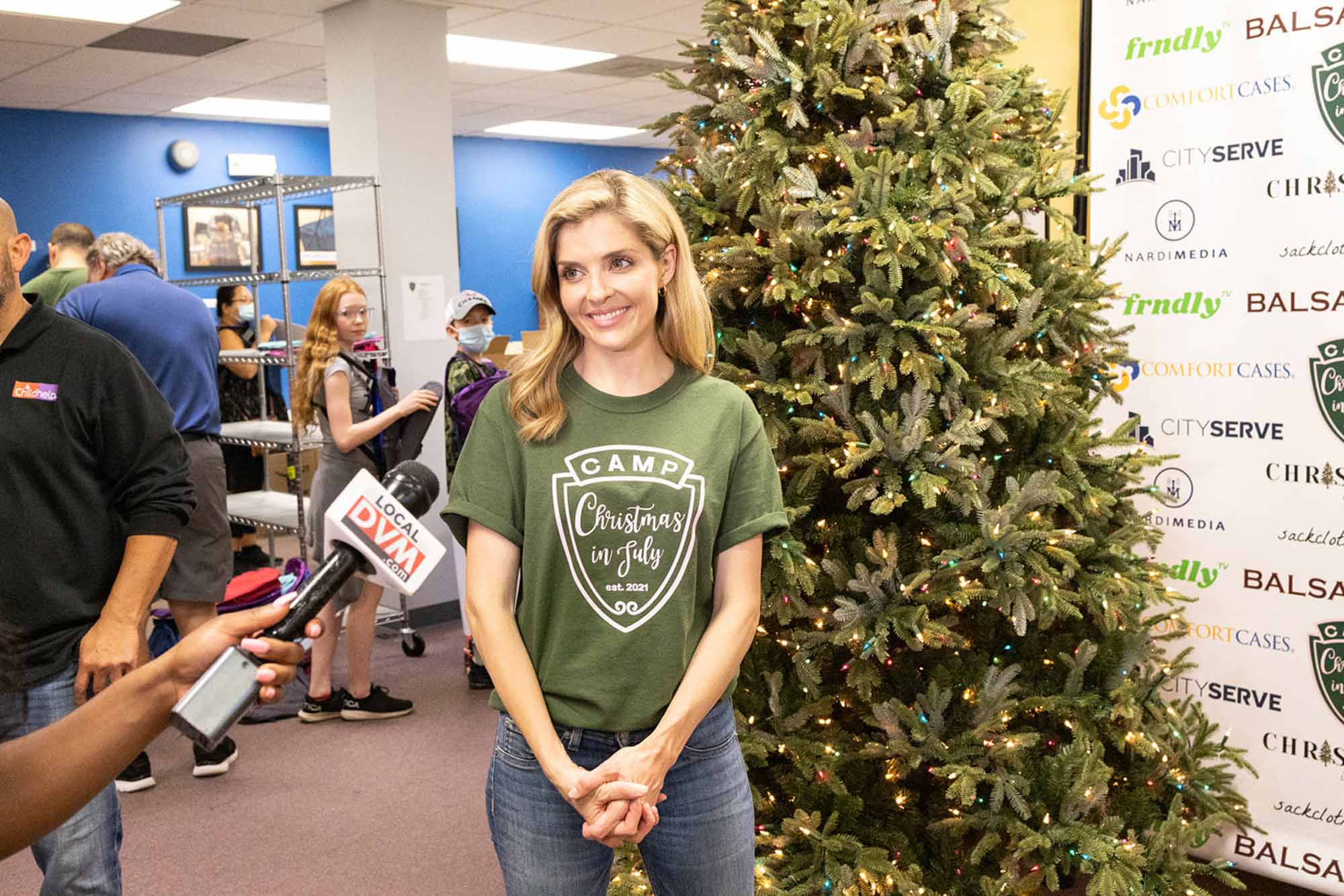 Jen Lilley giving an interview at a non-profit organization