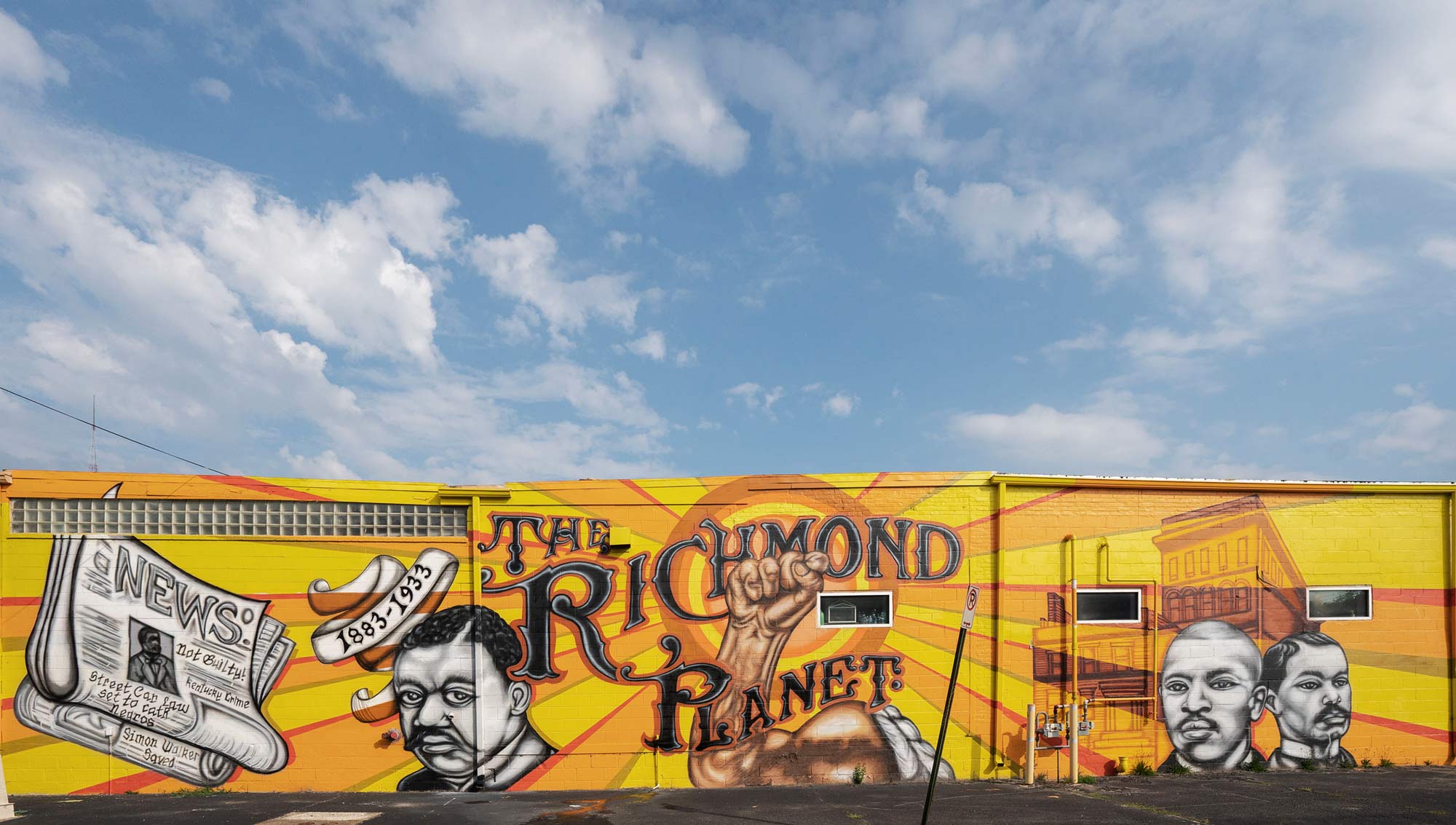 A mural on the side of a building with the words The Richmond Planet