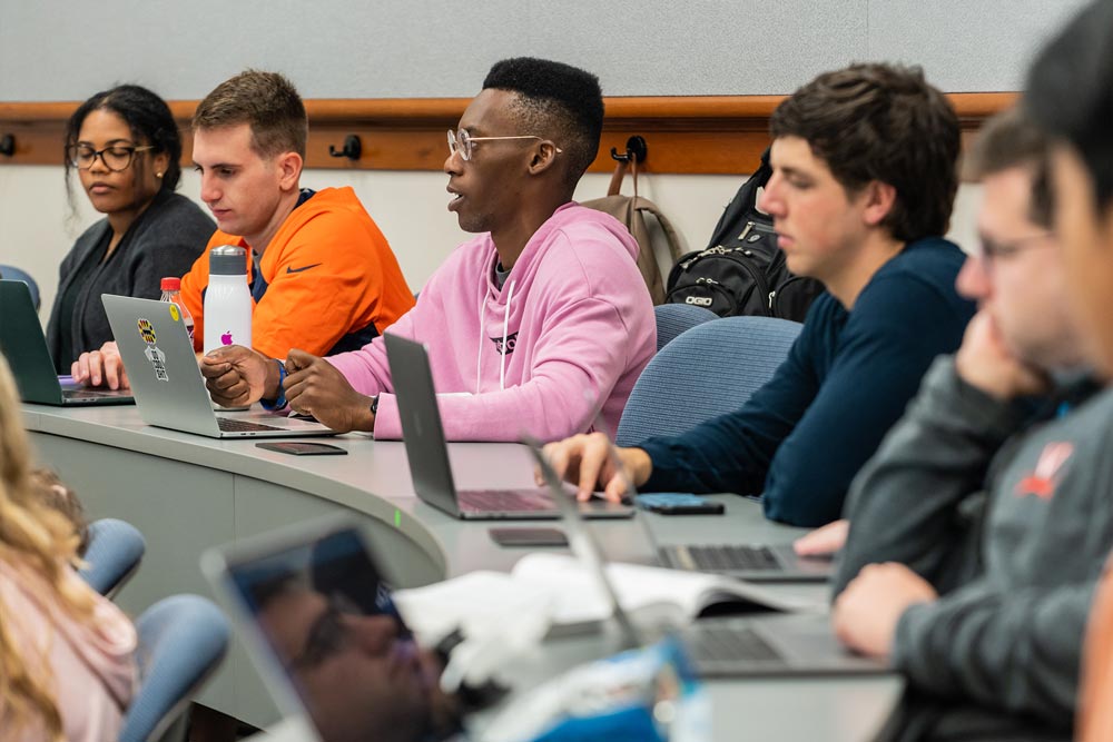 A student engages while seated