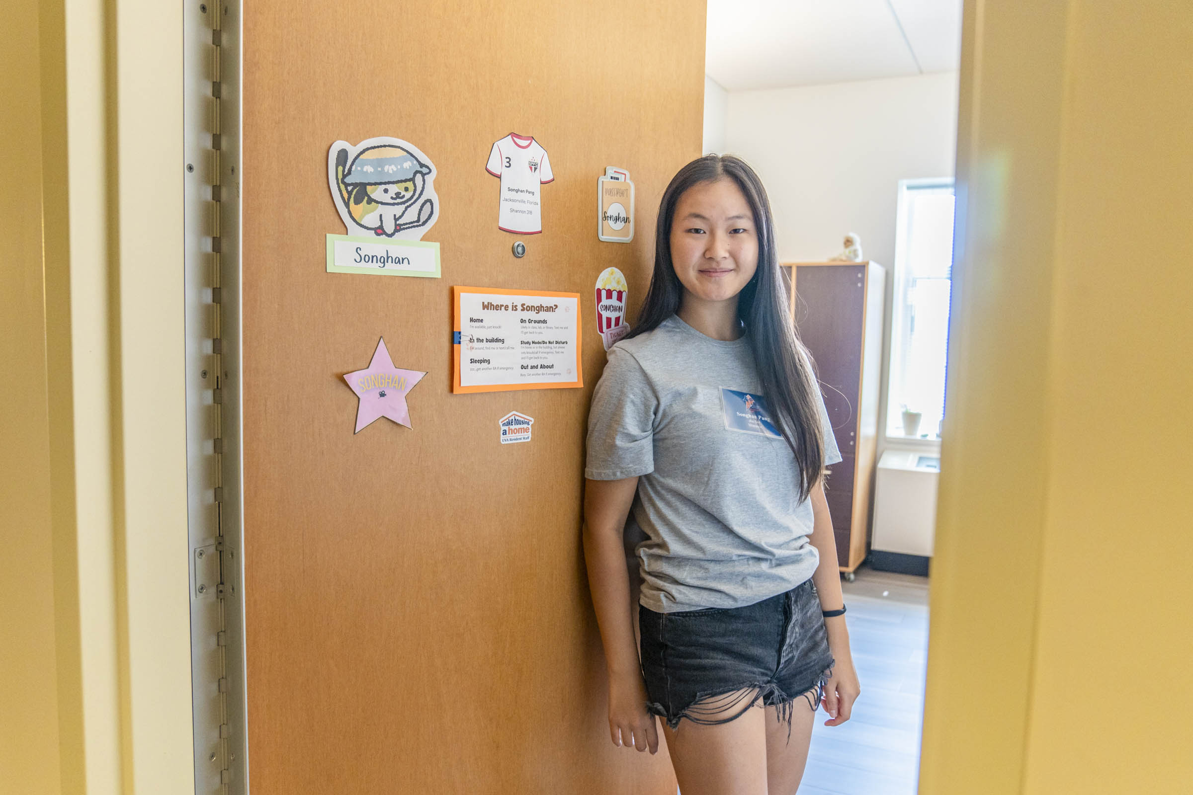 Songhan poses by her dorm door
