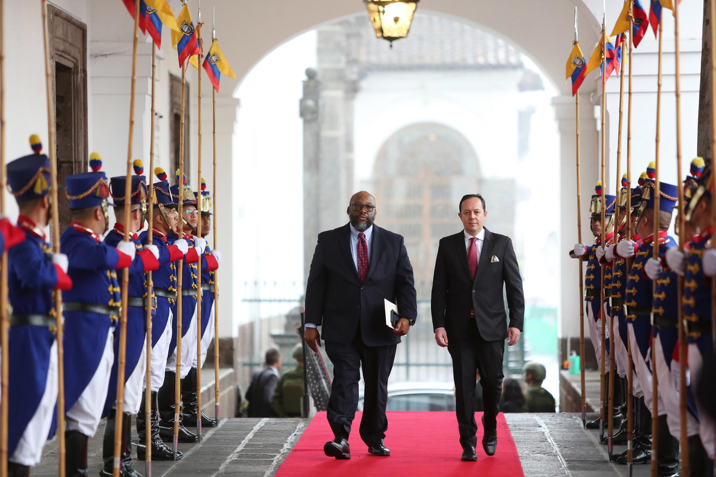 Art Brown walking with a memeber of the Ecuadorian government.