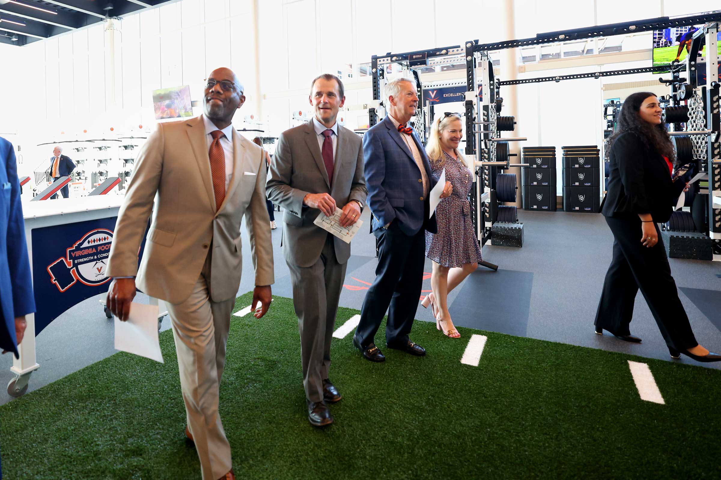 Ryan, center, gets his first glimpse at the football operations center.