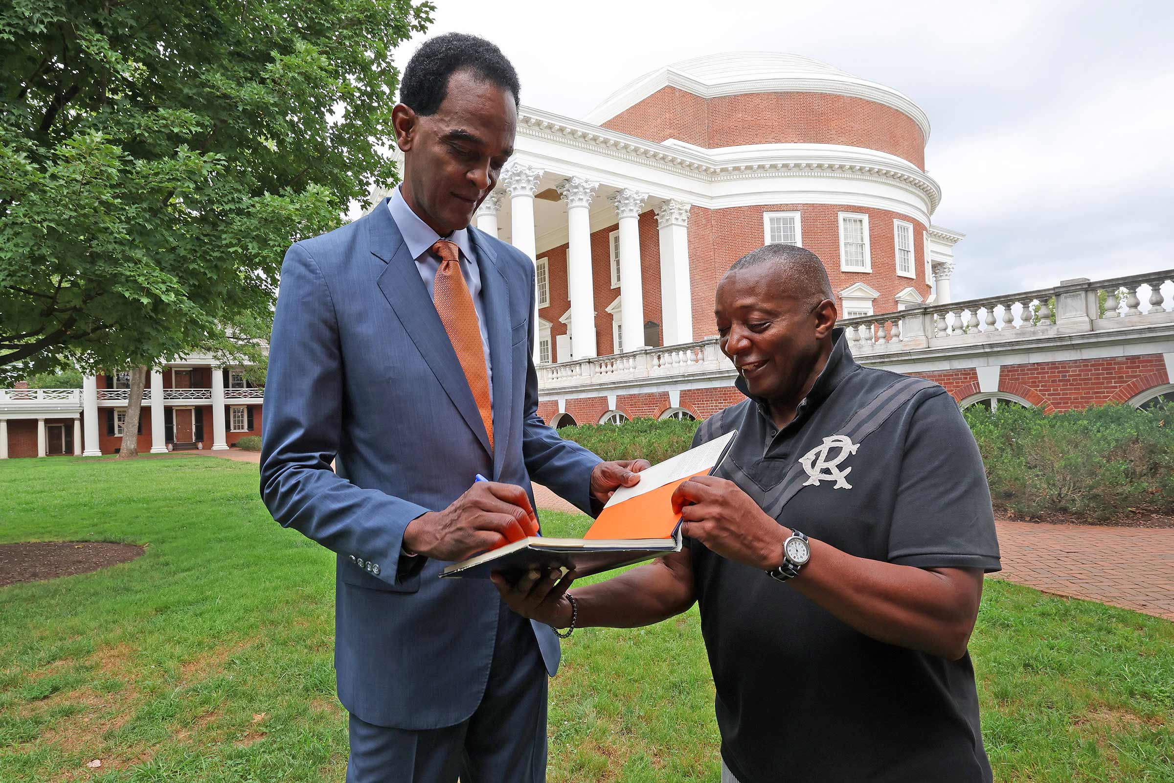 Rucker’s book, “A Pictorial History of UVA Basketball,” features Sampson on the cover. A photo of Rucker himself can be found on page 206. He’s cheering the Cavaliers on from the student section. 