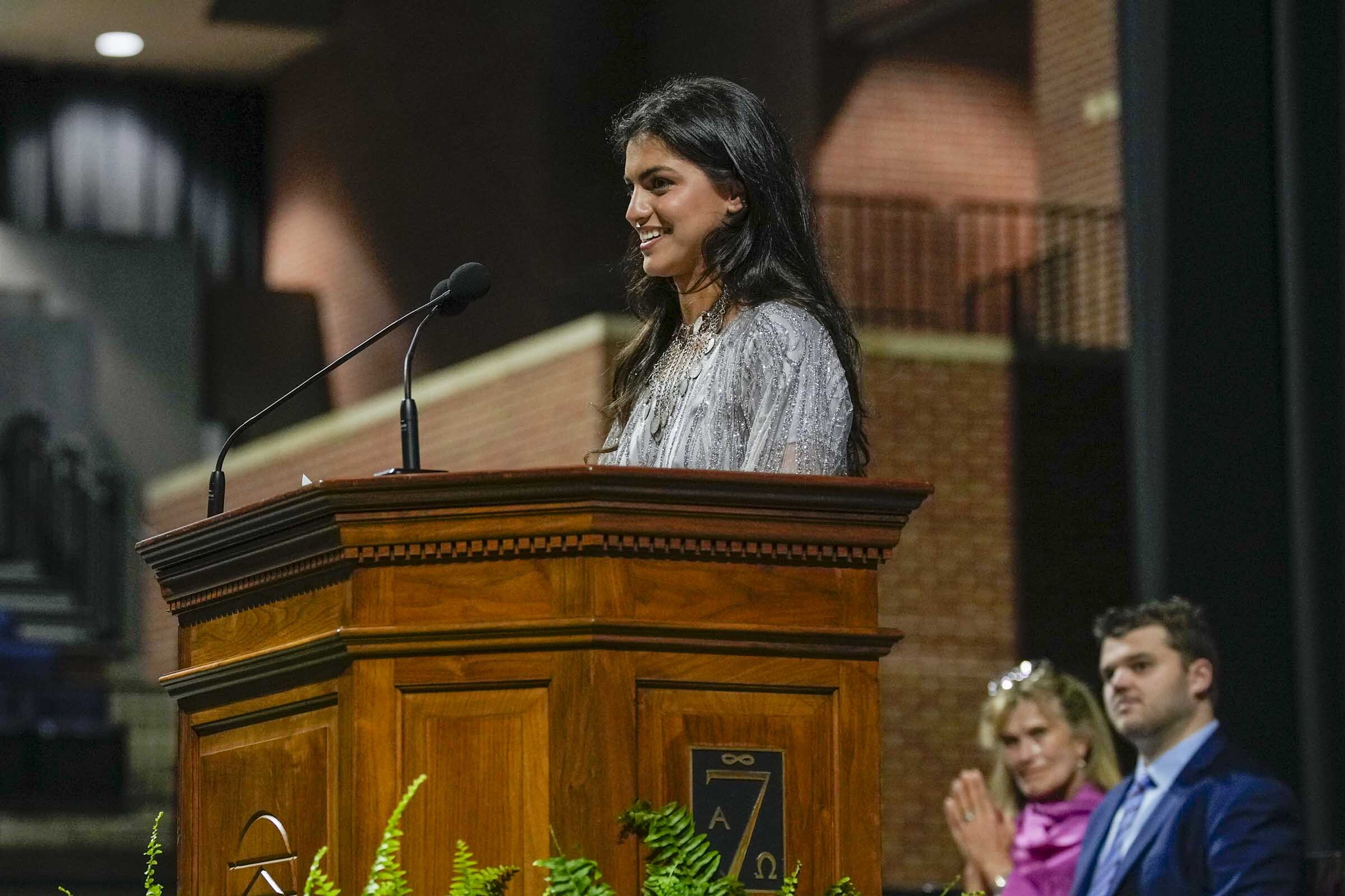 Lara Arif speaking at the podium at Valediction 2023