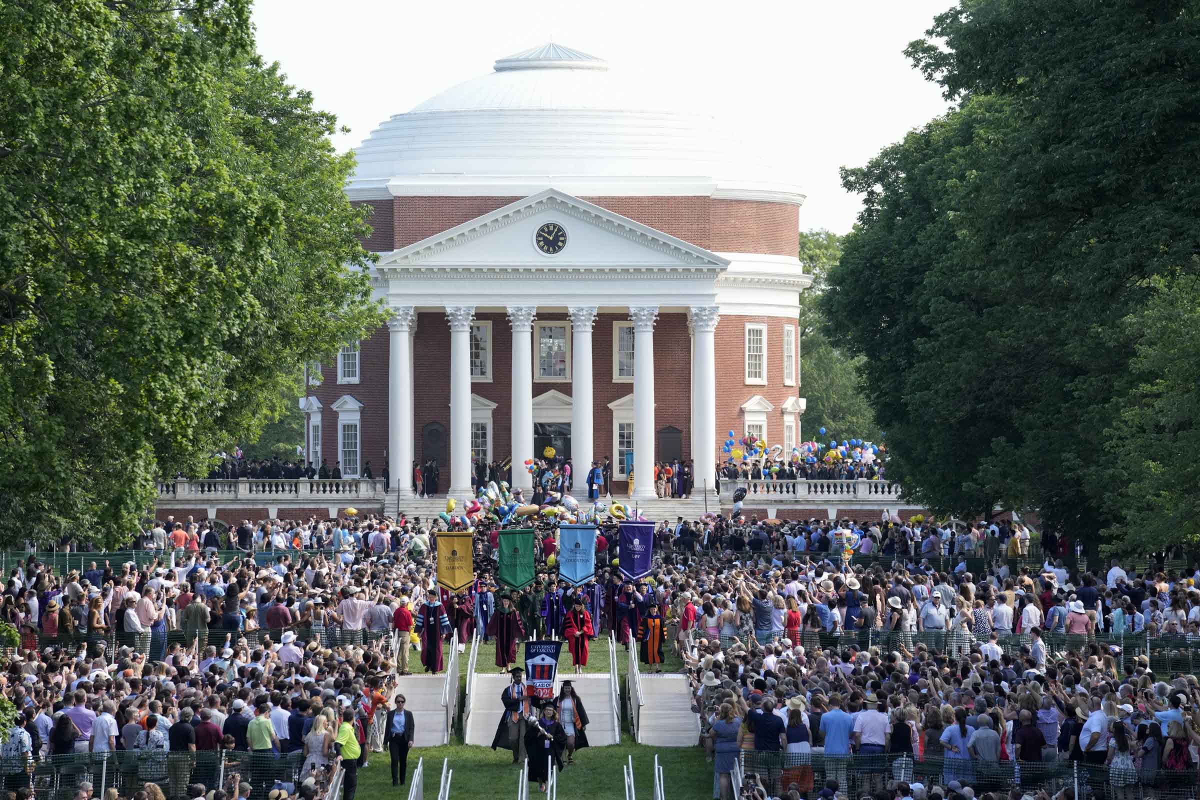 The procession begins down the UVA Lawn, filled with spectators