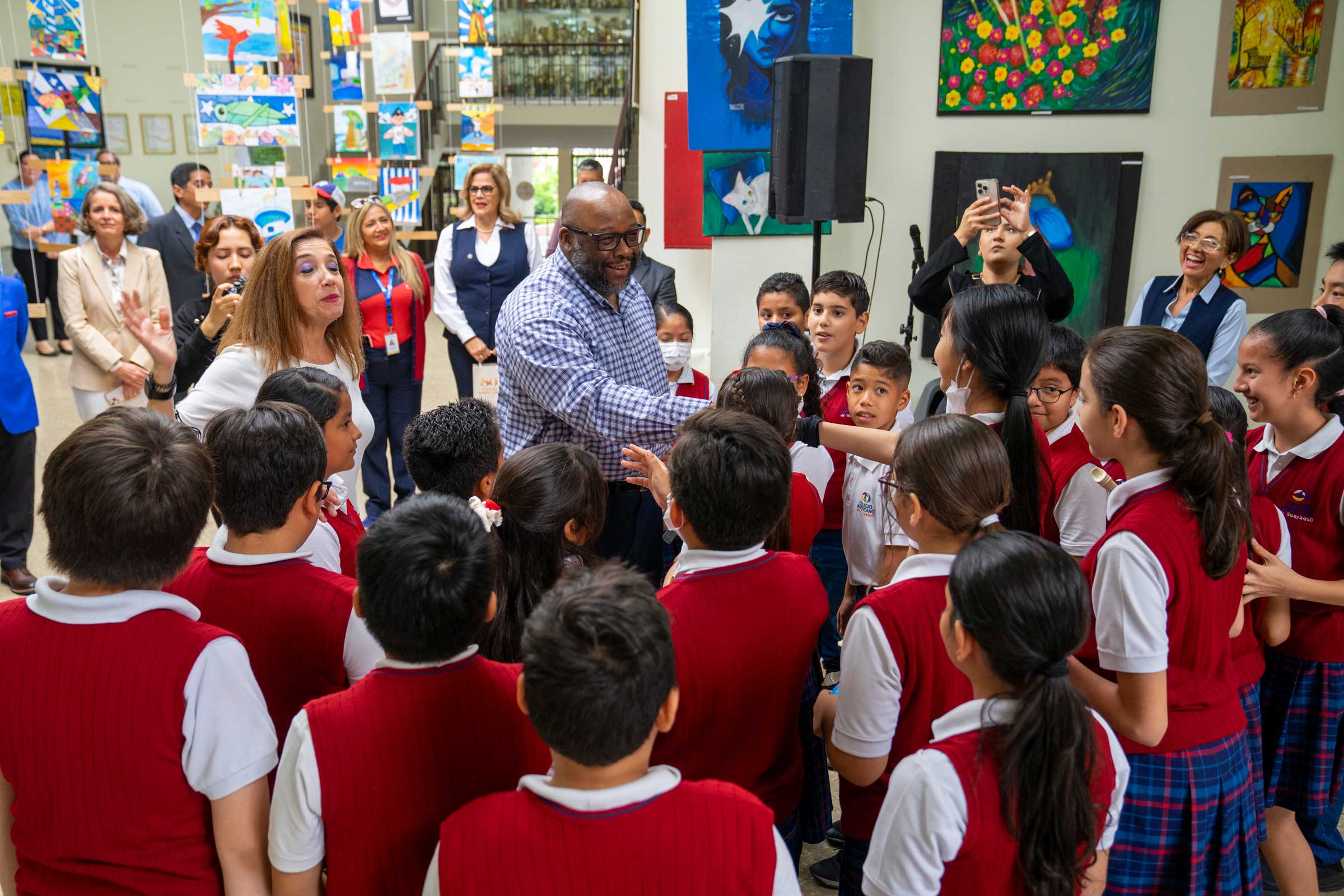 Art Brown meeting students in an Ecuadorian elementary school.