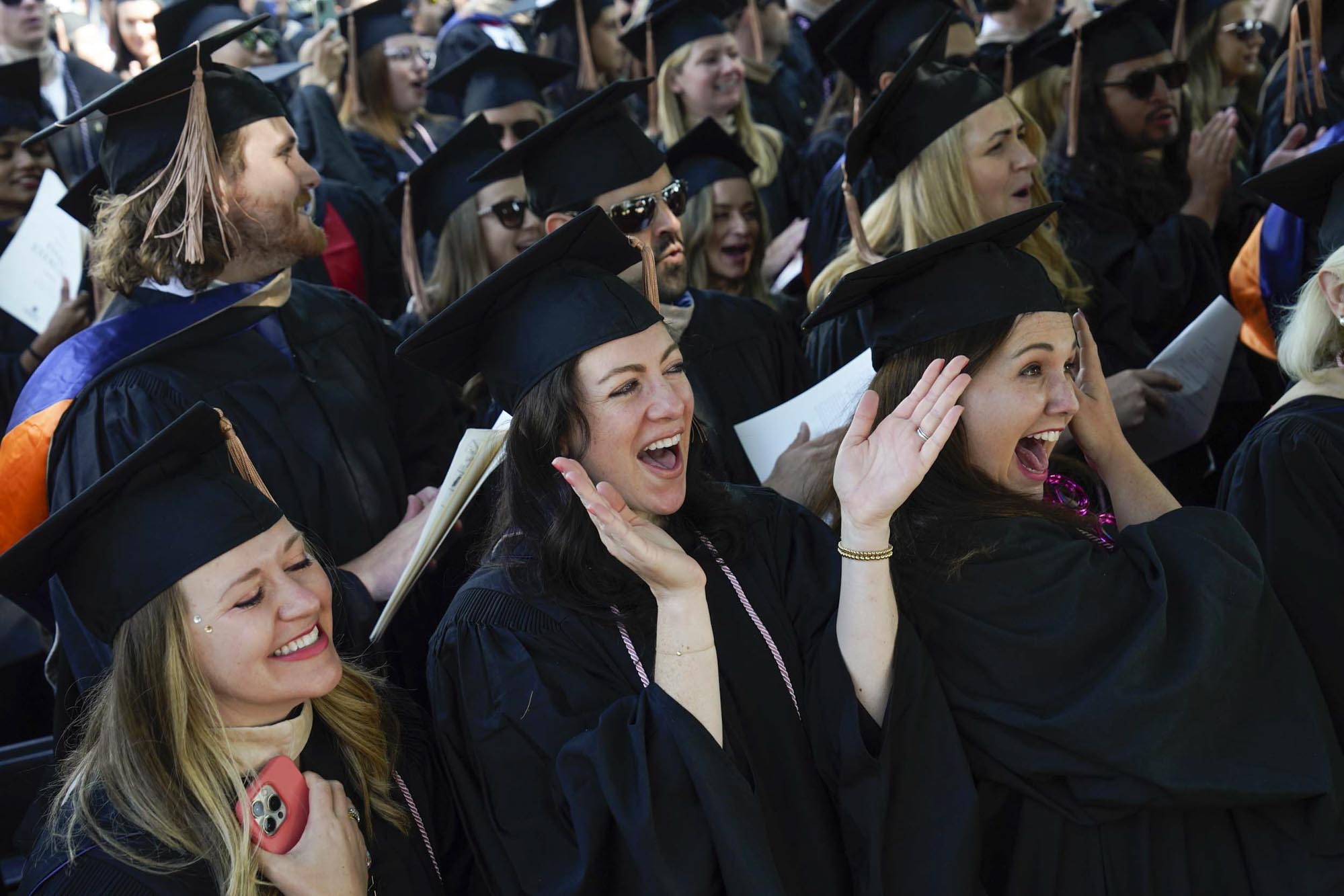 Graduates celebrating the confering of degrees