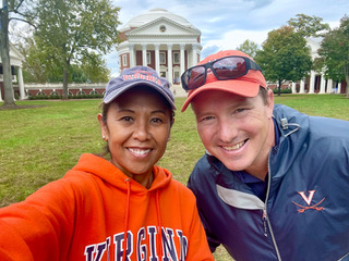A couple pose for a selfie in front of the Rotunda