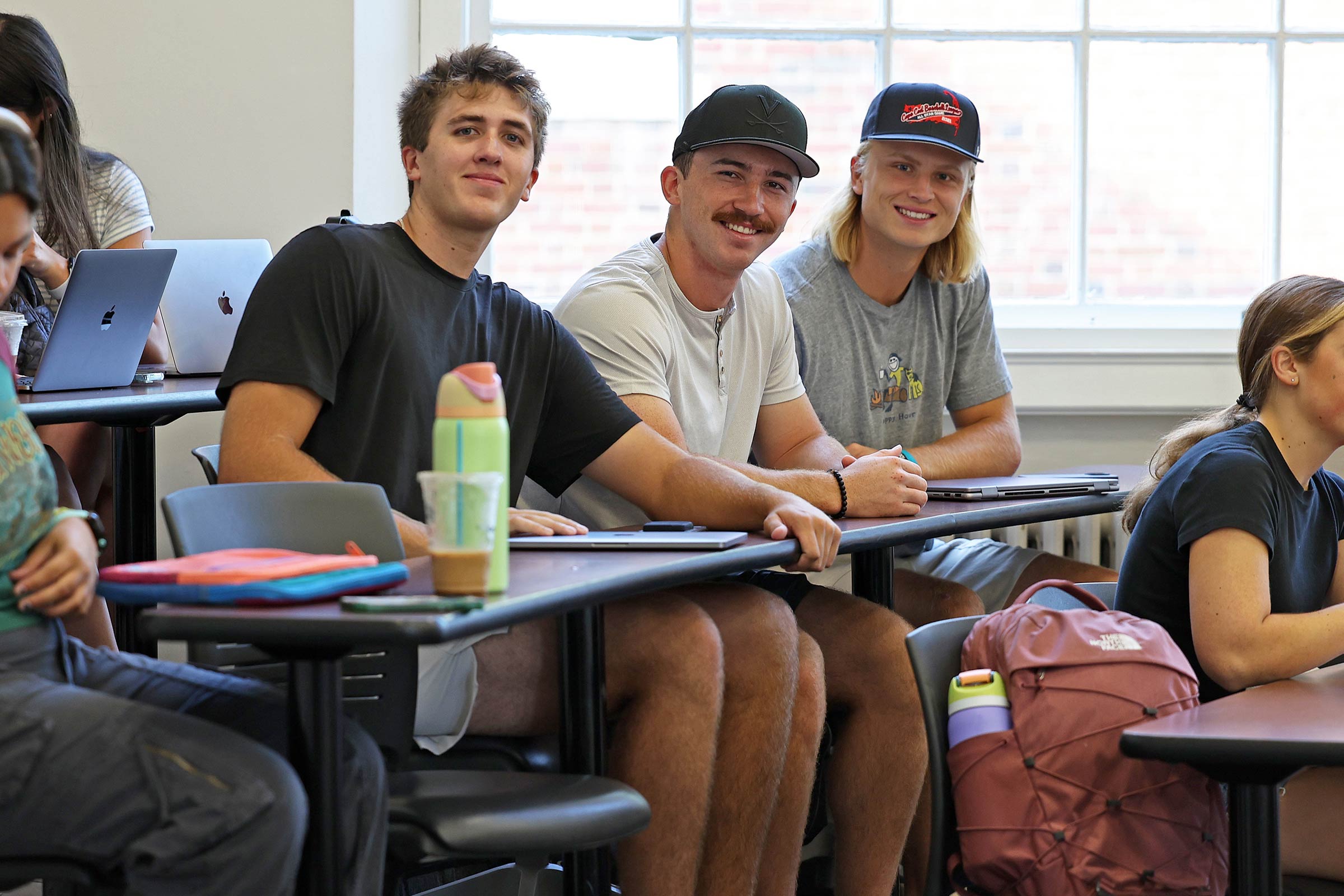 Portrait of a group of students in their classroom.