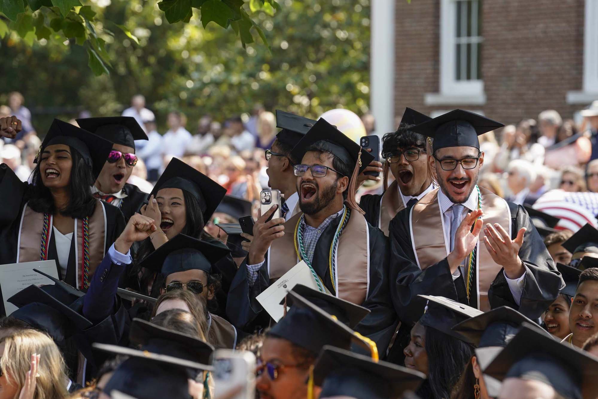 Graduates celebrating the confering of degrees
