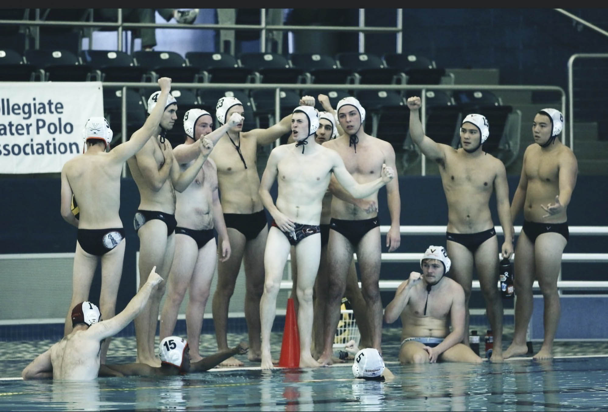 Mens Polo Team Celebrating a win  by the pool