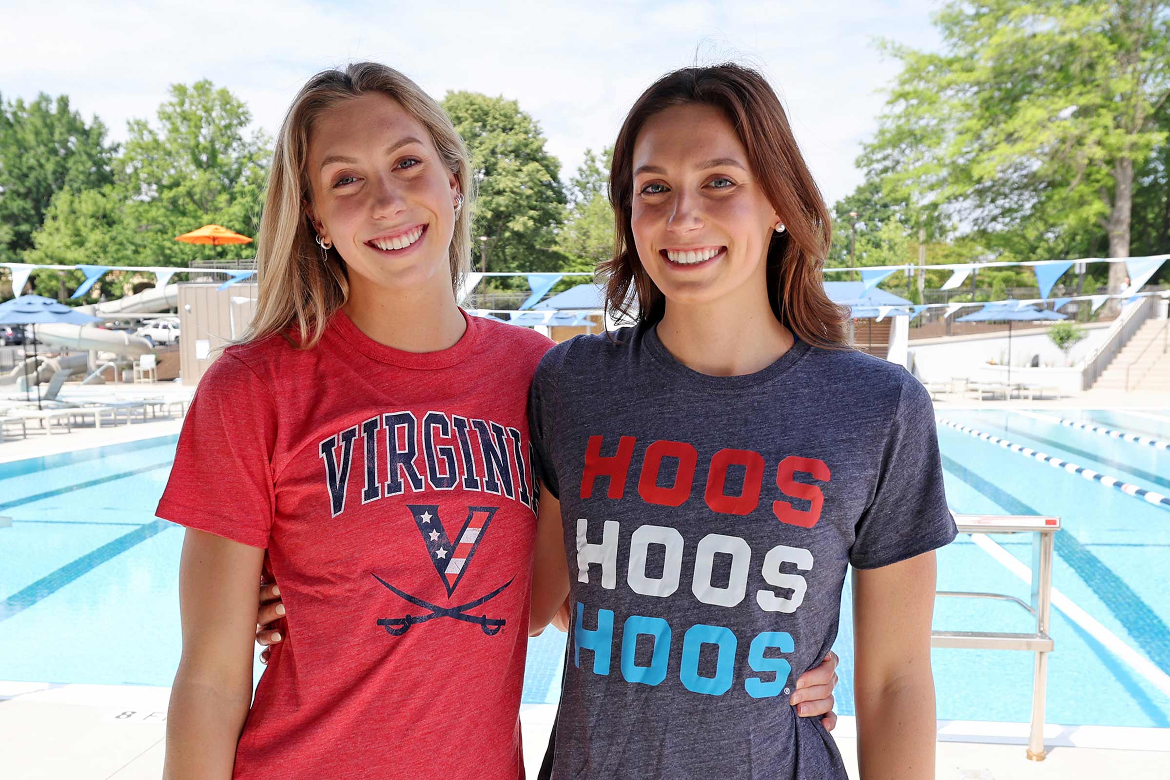 The Walsh sisters stand together wearing Red, White, and Hoo gear