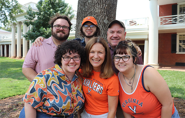Jackie Brence and family together on the Lawn