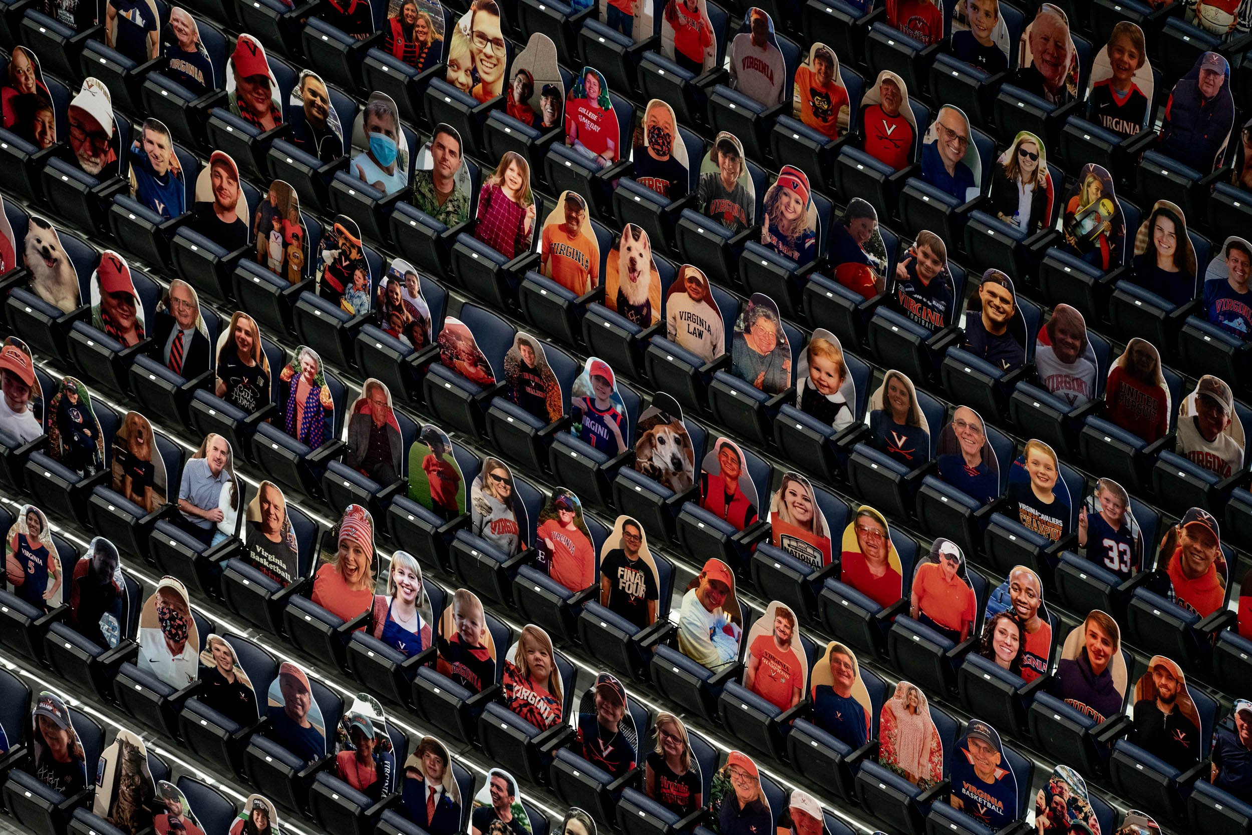 People cutouts in stadium seating