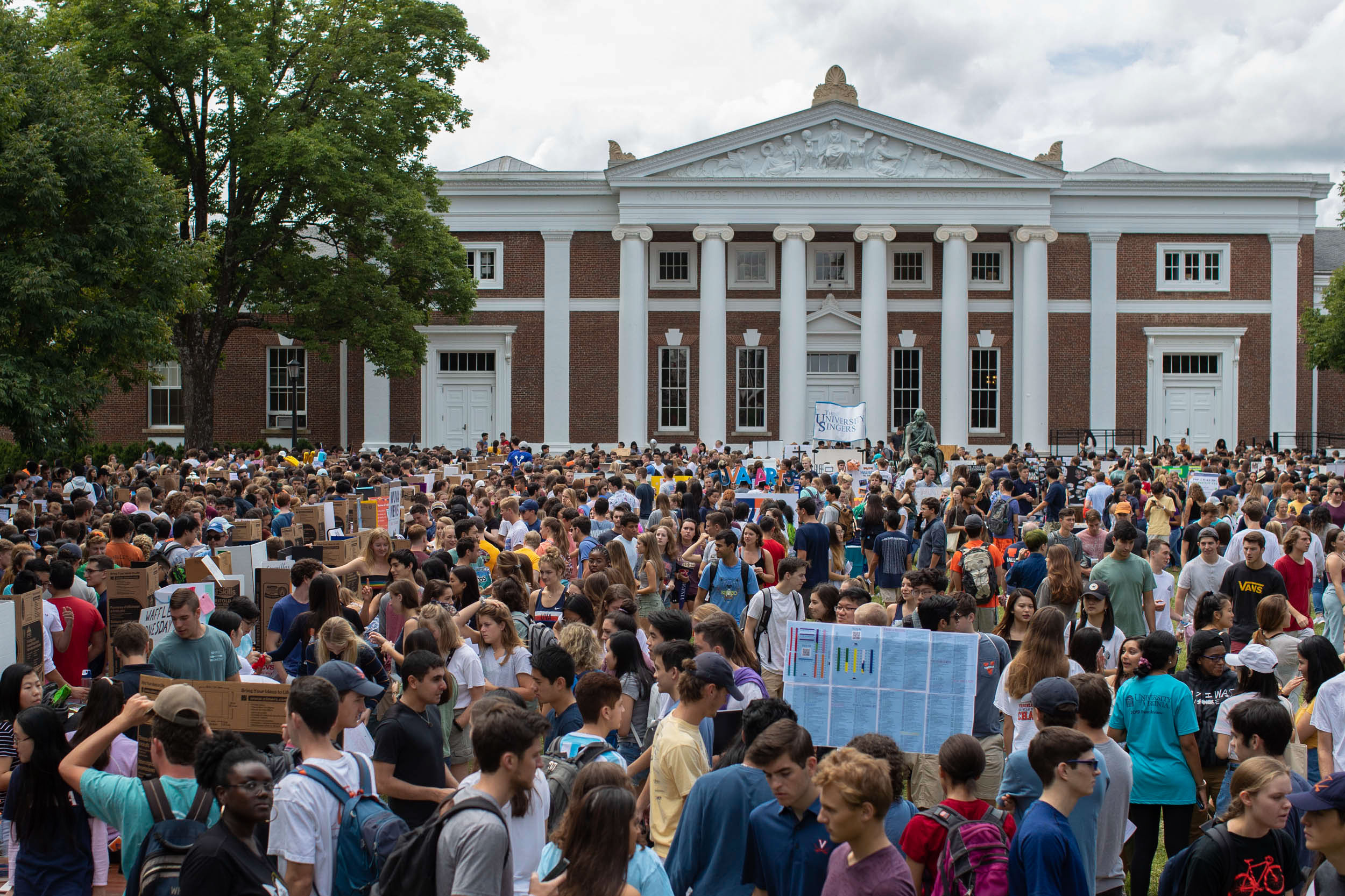 Thousands of students cover the lawn as they look at the booths of clubs and organizations they can join
