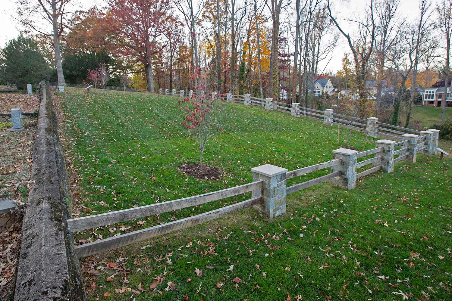 Wooden and stone fence marks off an African American Burial site