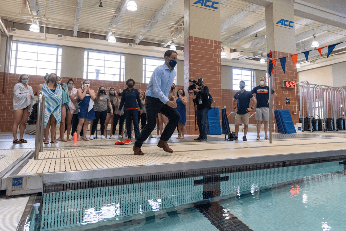 President Ryan Running towards pull while students watch