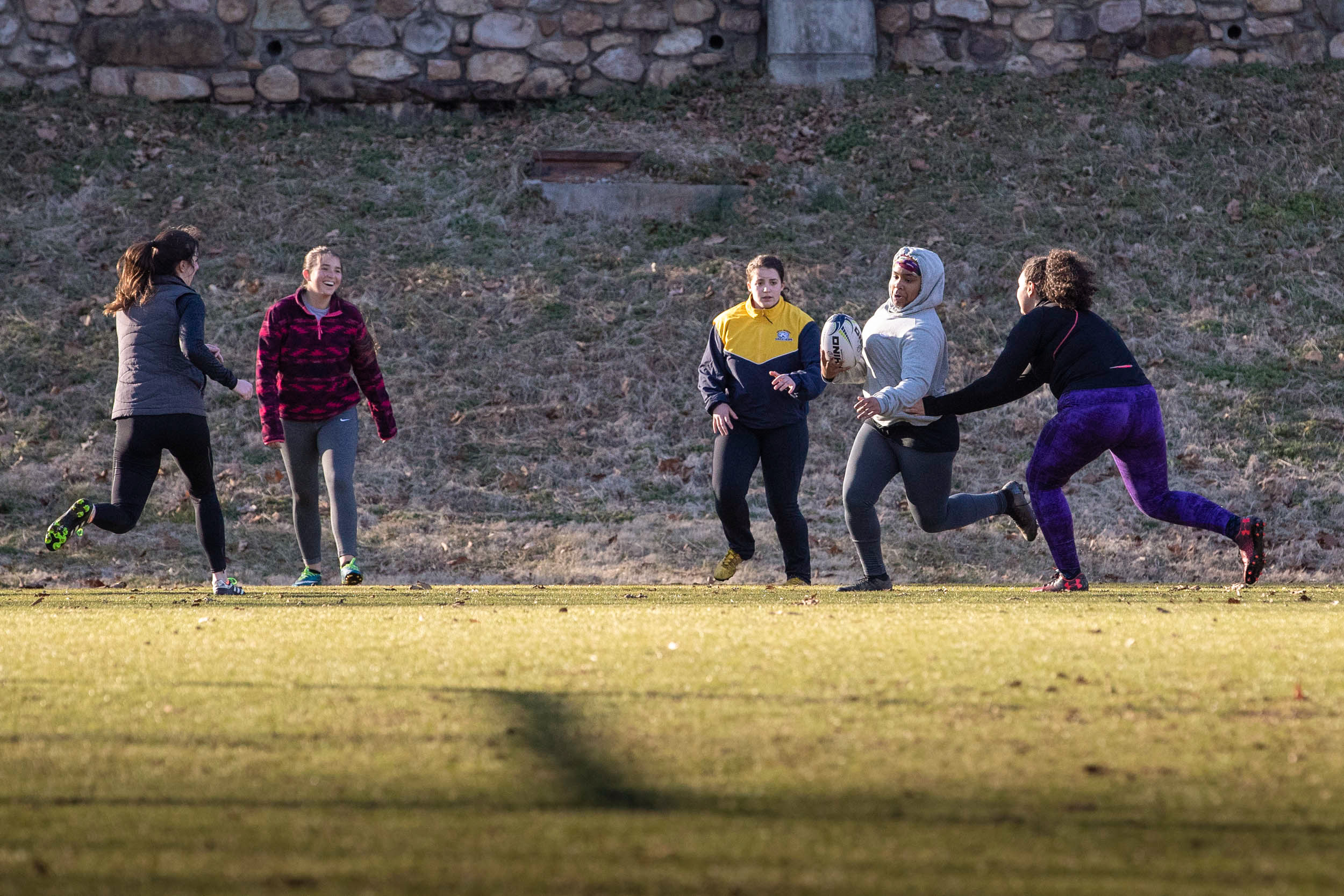 Robinson, second from right, playing rugby with some other women