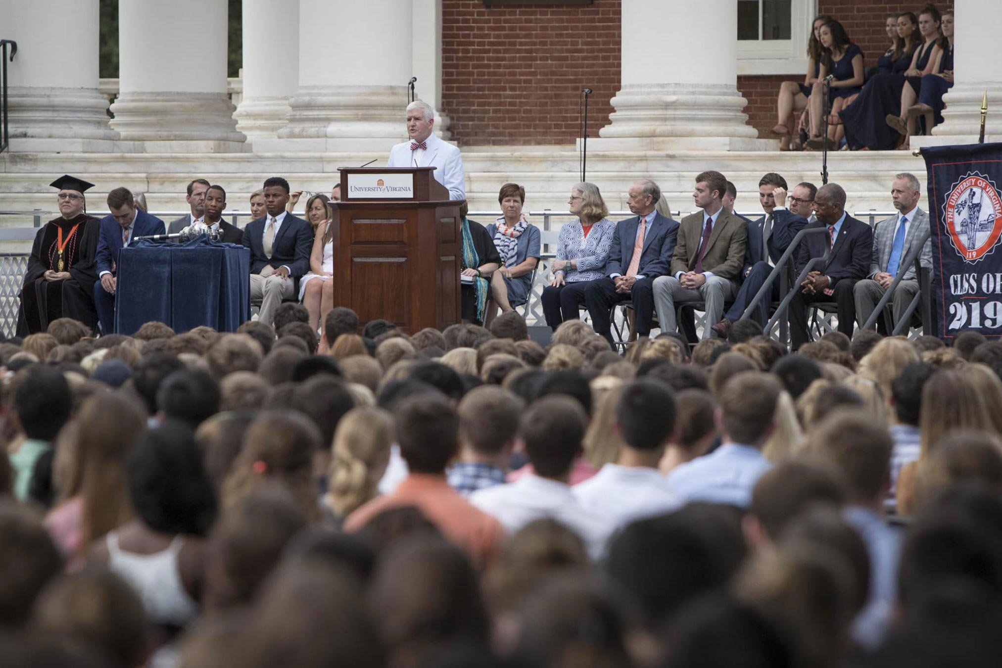 Groves standing at the podium during final exercises giving a speech