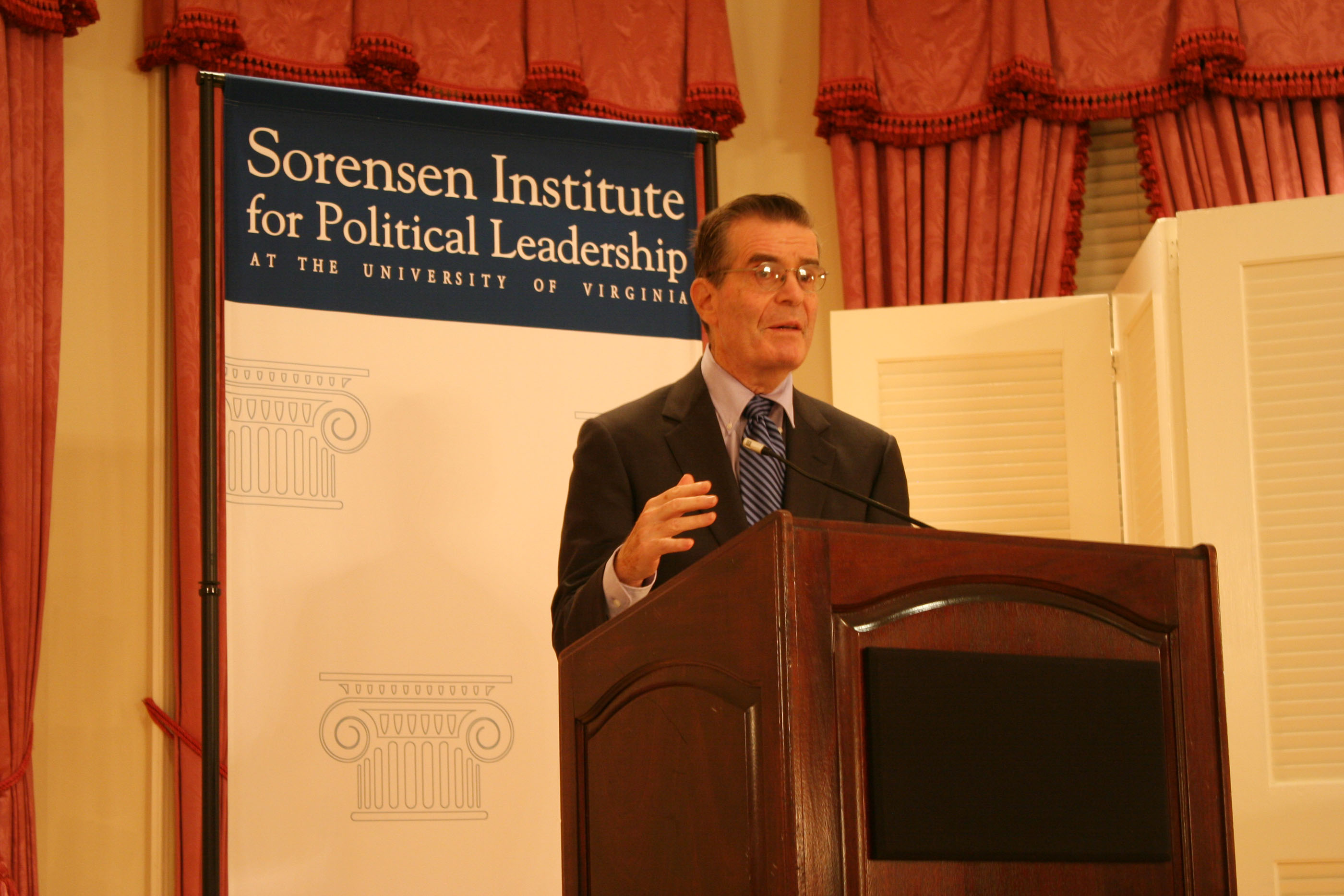 Theodore Sorensen speaking at a podium
